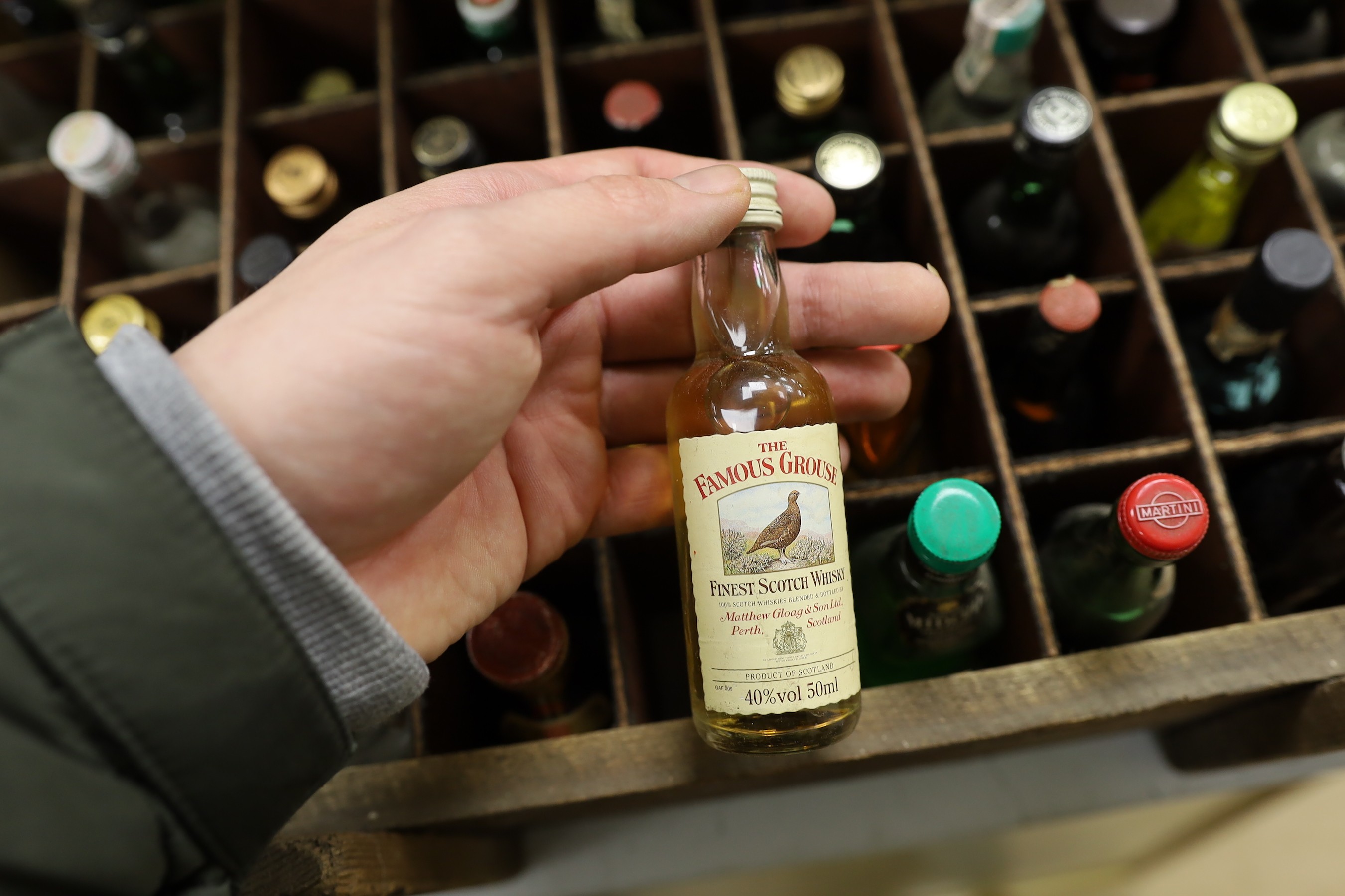 Sixty miniature spirits in collectors wooden box